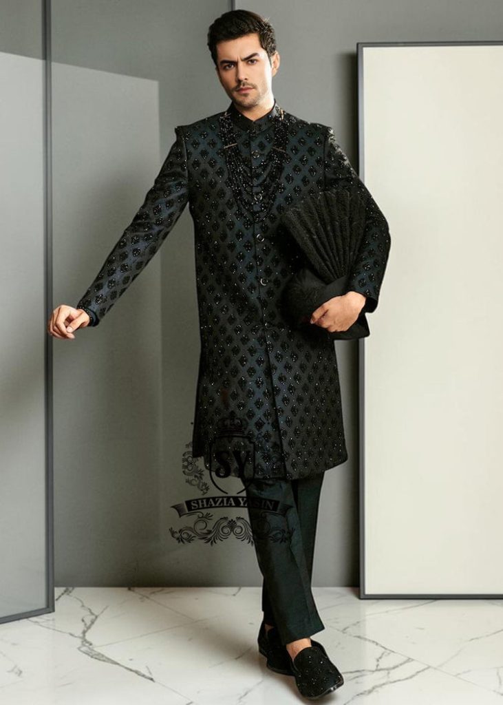 Black Embroidered Sherwani dignified and sophisticated design, this sherwani in deep black exudes power and elegance. Crafted from premium fabric, intricate embroidery that adds a touch of regal artistry without overpowering its sleek silhouette. The refined tailoring make it an ideal choice for grooms, formal receptions, and grand celebrations.