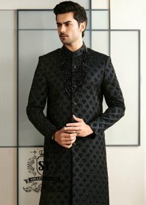Black Embroidered Sherwani dignified and sophisticated design, this sherwani in deep black exudes power and elegance. Crafted from premium fabric, intricate embroidery that adds a touch of regal artistry without overpowering its sleek silhouette. The refined tailoring make it an ideal choice for grooms, formal receptions, and grand celebrations.