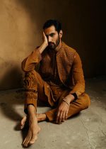 The pure elegance embodied in a Embellished waistcoat—a embroidered kurta pajama suit tailored for the groom basking in the spotlight.