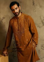 The pure elegance embodied in a Embellished waistcoat—a embroidered kurta pajama suit tailored for the groom basking in the spotlight.