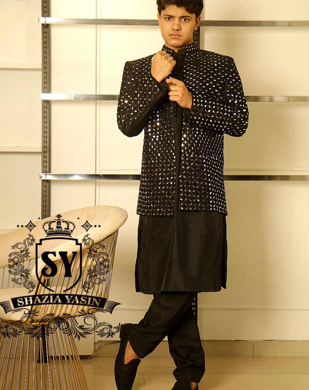 prince-coat-men-204a Best-seller black Mirror work embroidered Prince Coat is once again available for Wedding and Occasion in our Showroom - Image 1